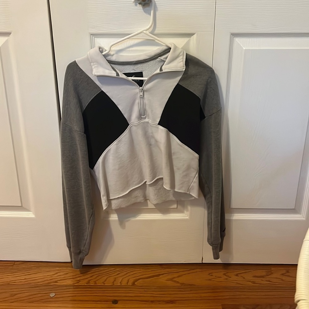 This crew neck is from Hollister, and a size small